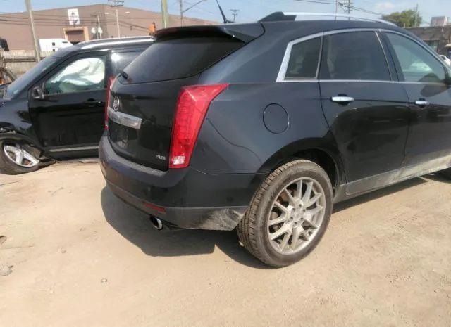 Photo 3 VIN: 3GYFNFE39ES660145 - CADILLAC SRX 