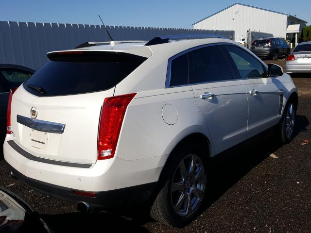 Photo 3 VIN: 3GYFNFEY4AS643601 - CADILLAC SRX PREMIU 