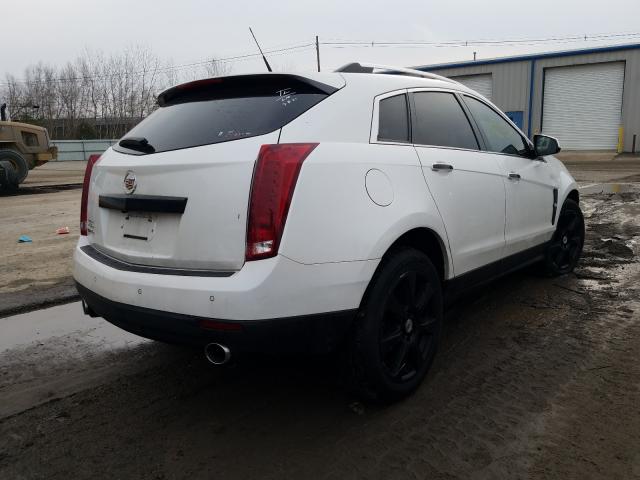 Photo 3 VIN: 3GYFNFEY8BS633669 - CADILLAC SRX PREMIU 