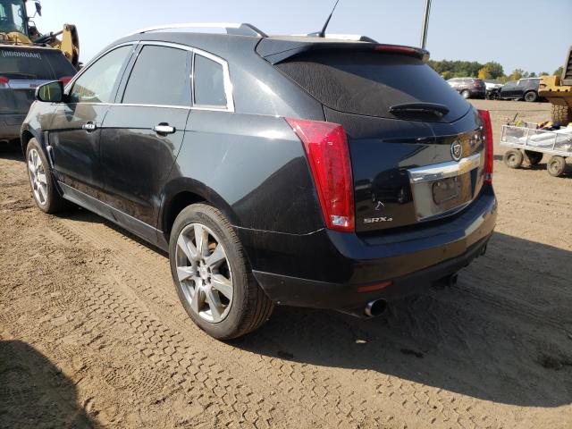 Photo 2 VIN: 3GYFNFEYXBS649100 - CADILLAC SRX PREMIU 