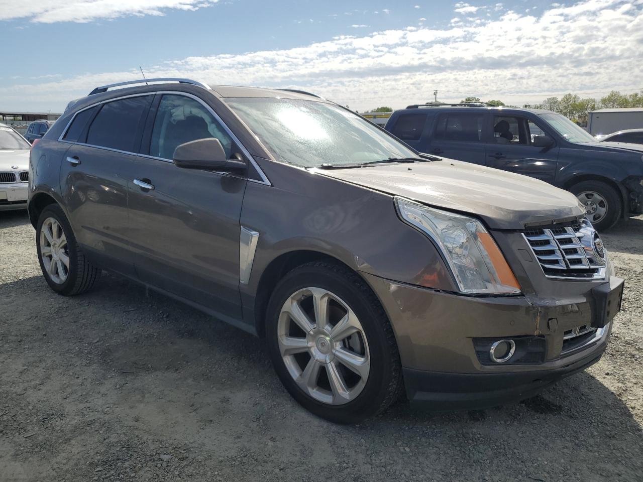 Photo 3 VIN: 3GYFNGE32ES613335 - CADILLAC SRX 