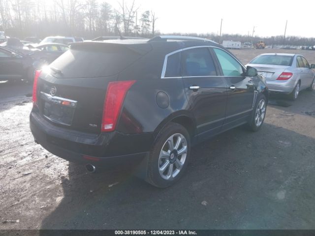 Photo 3 VIN: 3GYFNGE33ES661619 - CADILLAC SRX 