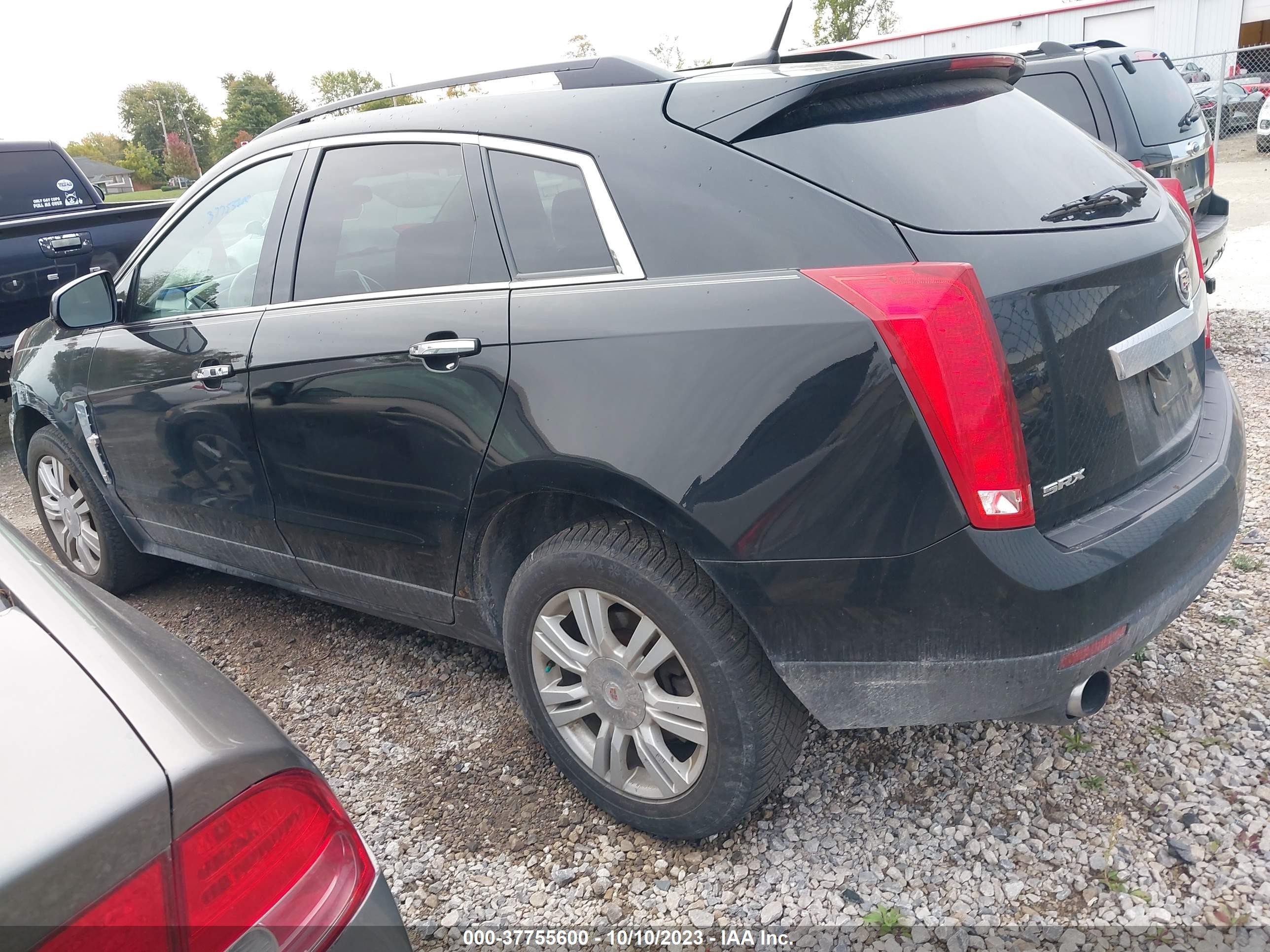 Photo 2 VIN: 3GYFNGE34CS652005 - CADILLAC SRX 