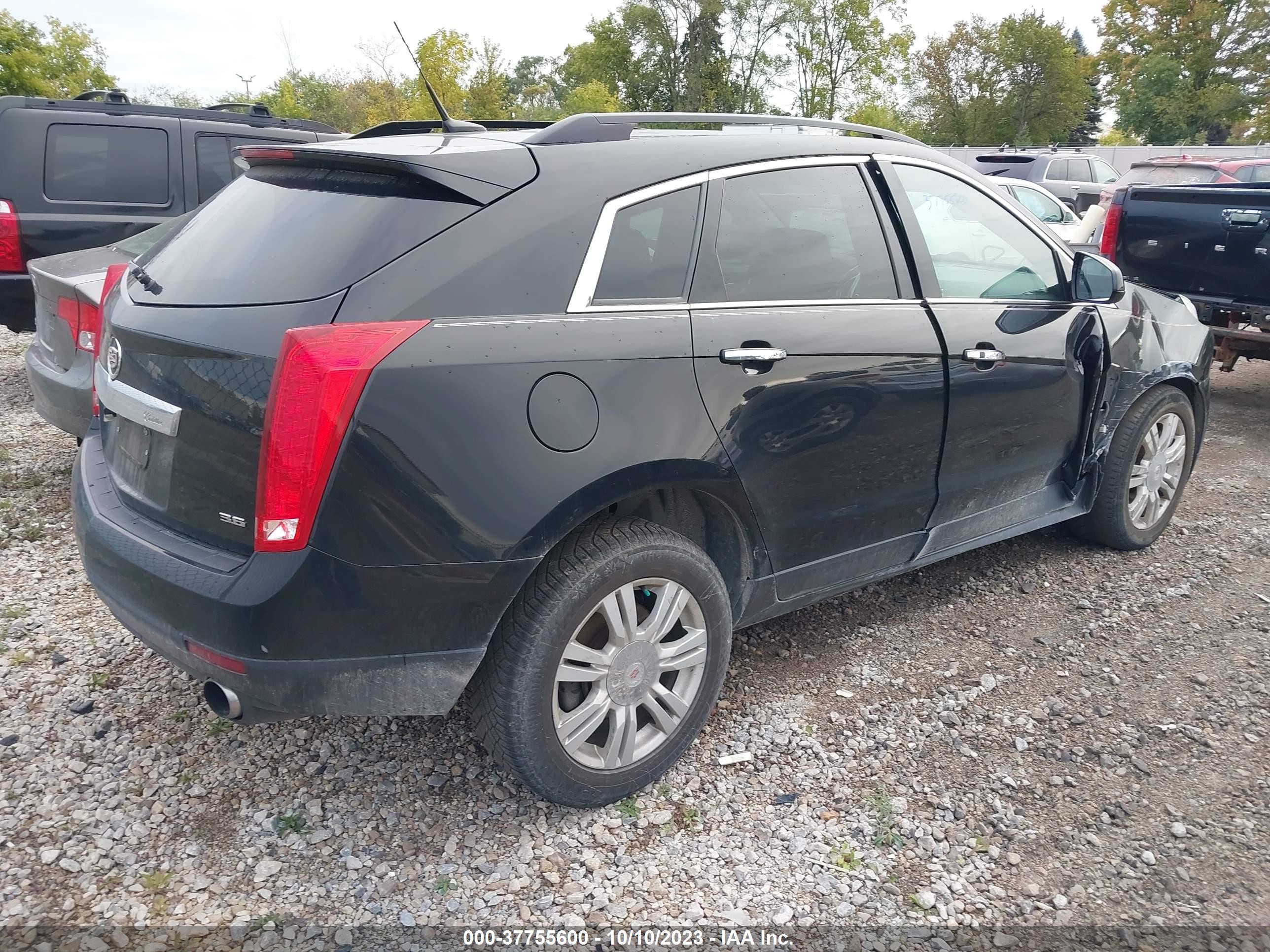 Photo 3 VIN: 3GYFNGE34CS652005 - CADILLAC SRX 