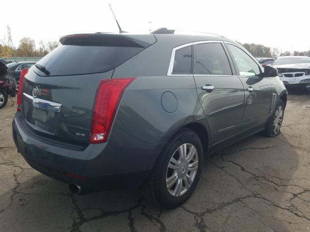 Photo 3 VIN: 3GYFNGE34DS550589 - CADILLAC SRX LUXURY 