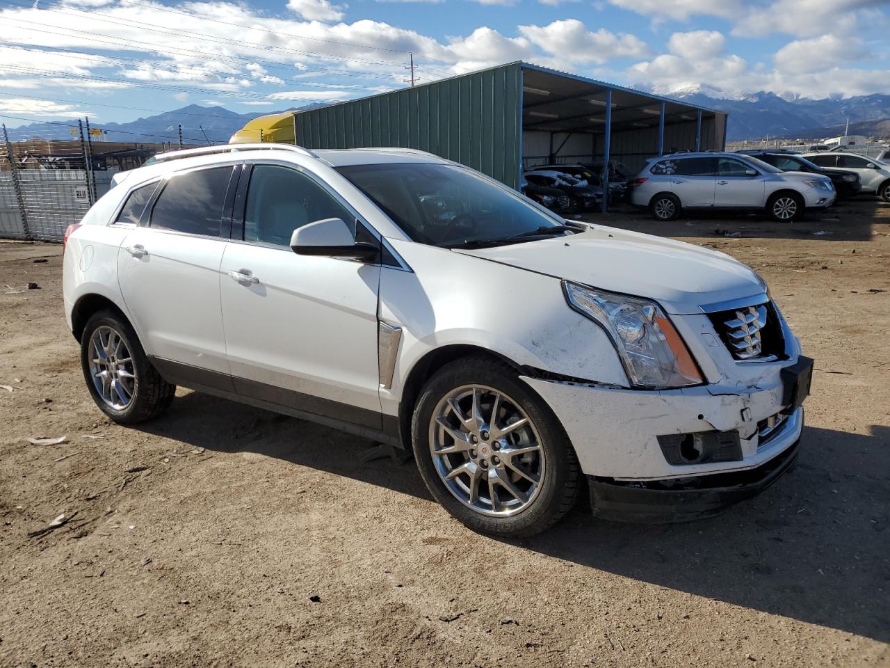 Photo 3 VIN: 3GYFNGE37ES688175 - CADILLAC SRX 