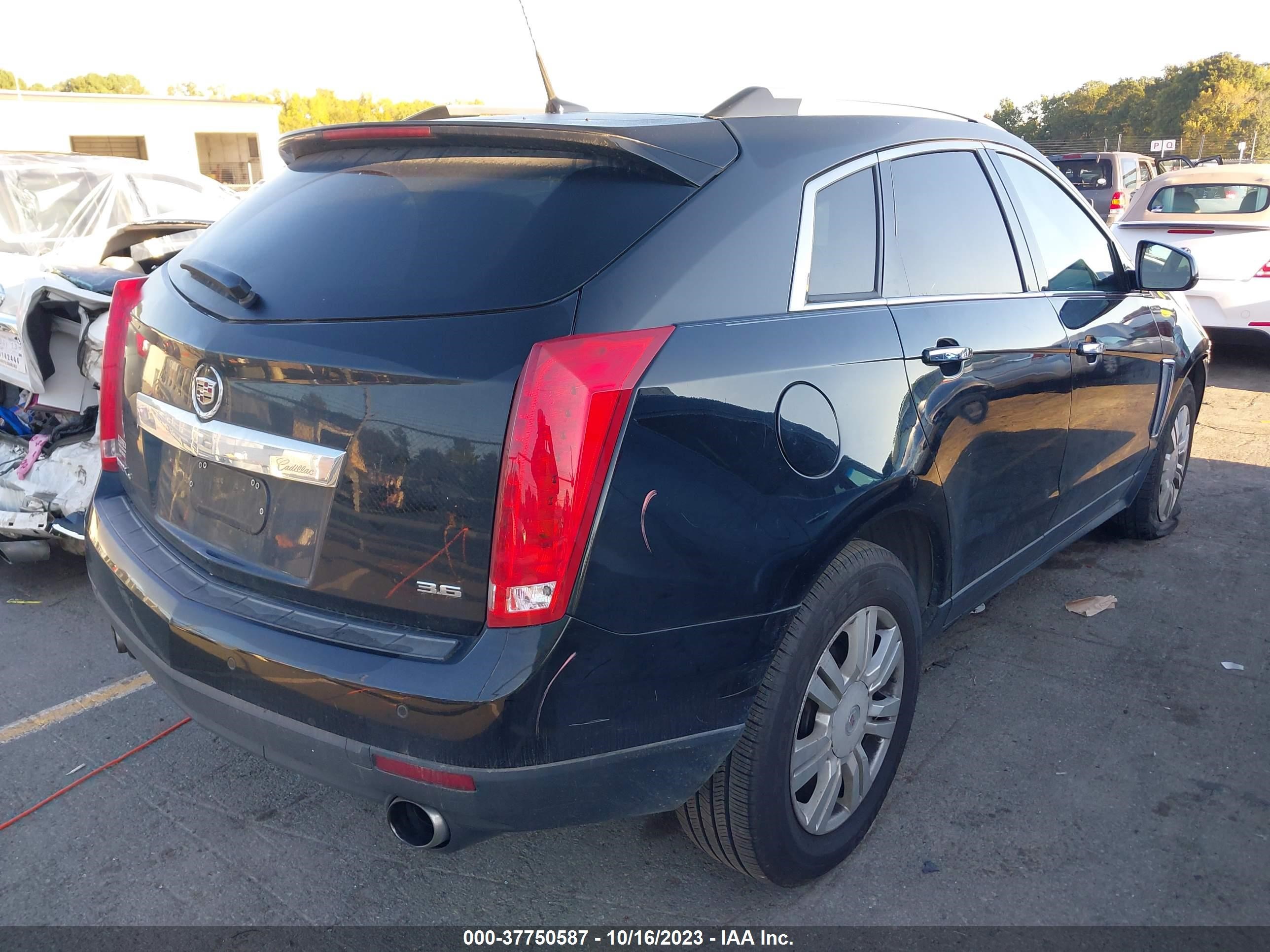 Photo 3 VIN: 3GYFNGE38DS615475 - CADILLAC SRX 