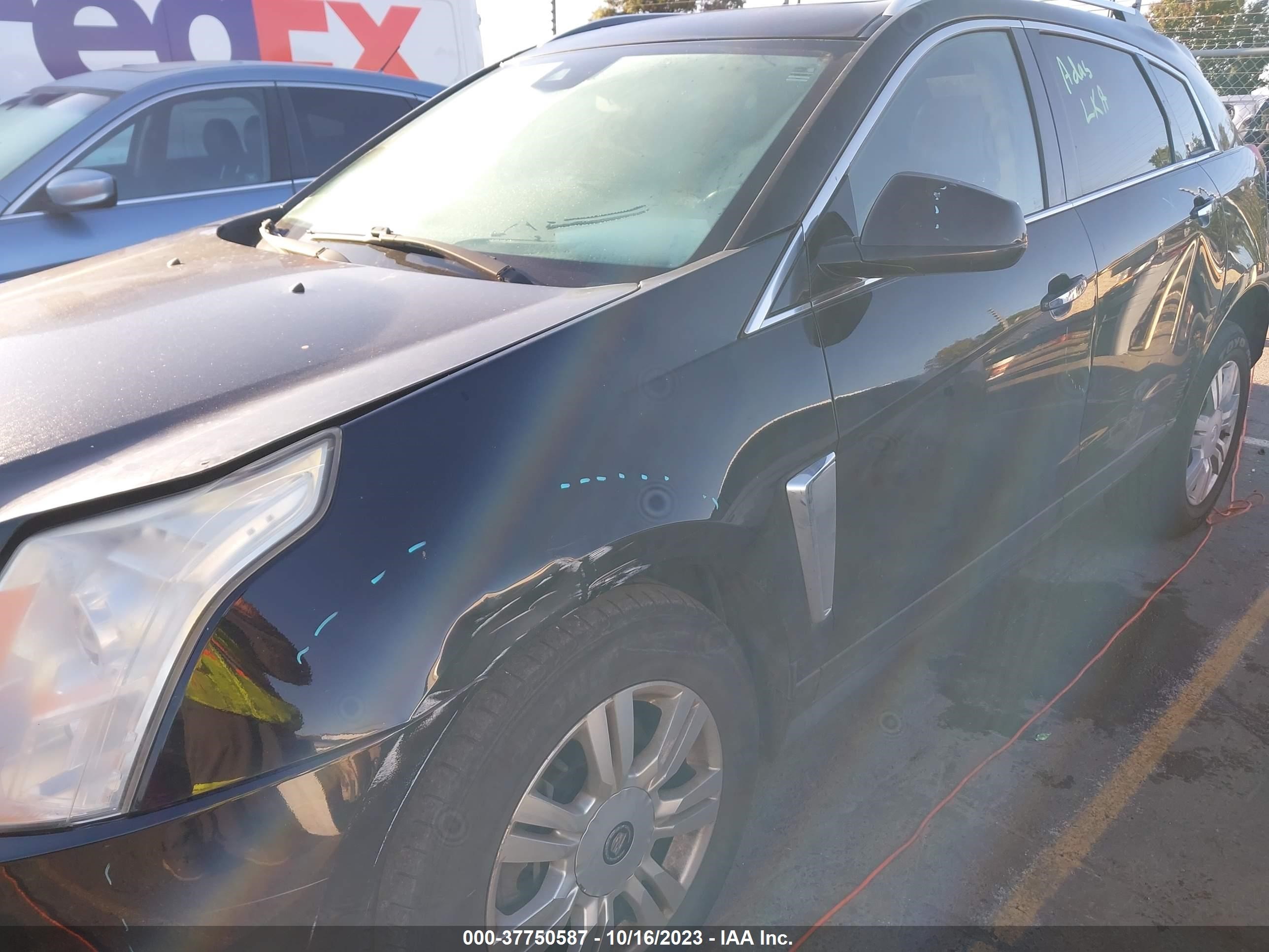 Photo 5 VIN: 3GYFNGE38DS615475 - CADILLAC SRX 