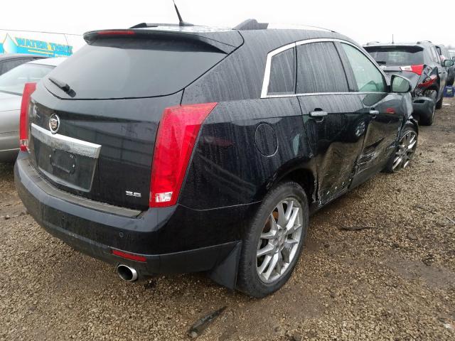 Photo 3 VIN: 3GYFNGE38ES614795 - CADILLAC SRX PREMIU 