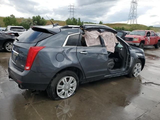 Photo 2 VIN: 3GYFNGE39DS591669 - CADILLAC SRX LUXURY 