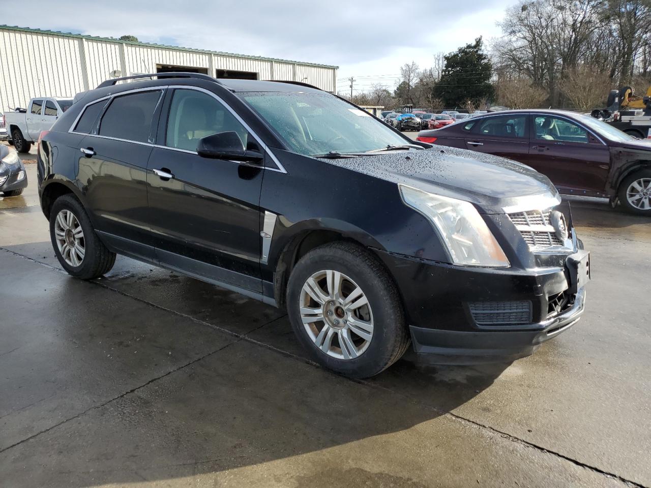 Photo 3 VIN: 3GYFNGEY5BS574490 - CADILLAC SRX 