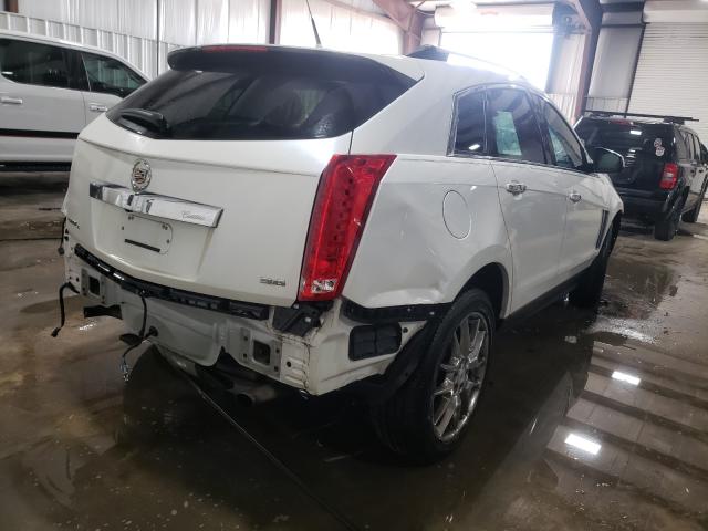 Photo 3 VIN: 3GYFNHE36DS557081 - CADILLAC SRX PERFOR 