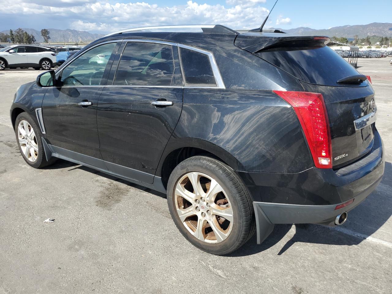 Photo 1 VIN: 3GYFNHE36DS581994 - CADILLAC SRX 