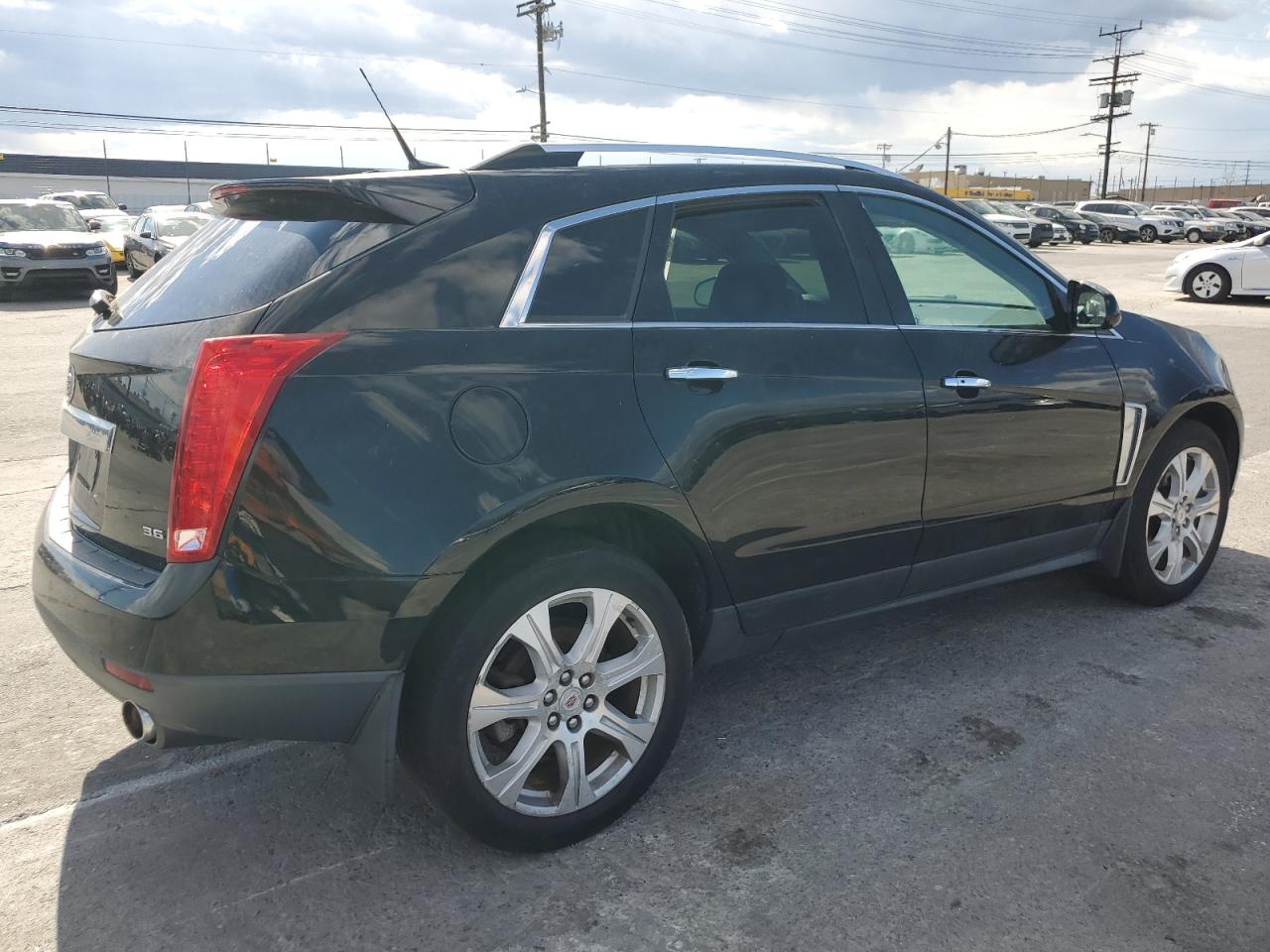 Photo 2 VIN: 3GYFNHE36DS581994 - CADILLAC SRX 