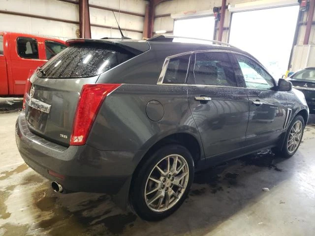 Photo 2 VIN: 3GYFNHE39DS552912 - CADILLAC SRX PERFOR 