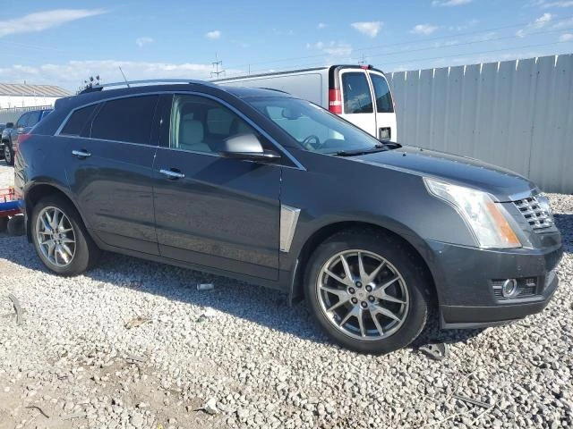 Photo 3 VIN: 3GYFNHE3XDS509101 - CADILLAC SRX PERFOR 