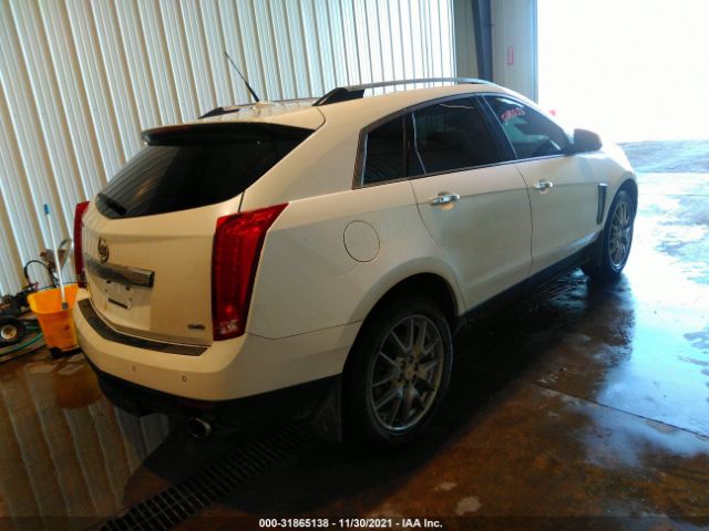 Photo 3 VIN: 3GYFNJE30DS568729 - CADILLAC SRX 