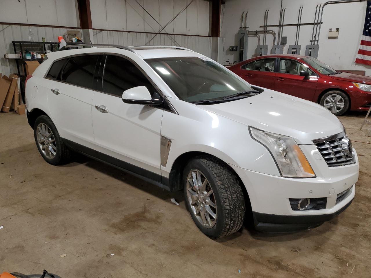 Photo 3 VIN: 3GYFNJE3XDS638138 - CADILLAC SRX 