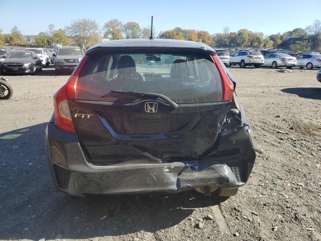 Photo 5 VIN: 3HGGK5G53HM706431 - HONDA FIT LX 