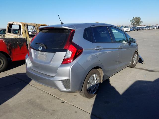 Photo 3 VIN: 3HGGK5G54HM710021 - HONDA FIT LX 