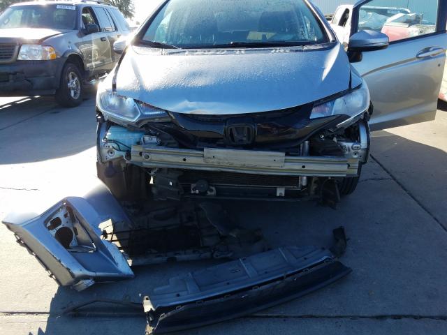 Photo 6 VIN: 3HGGK5G54HM710021 - HONDA FIT LX 