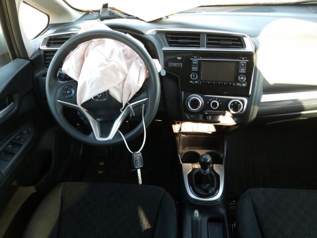 Photo 8 VIN: 3HGGK5G54HM710021 - HONDA FIT LX 