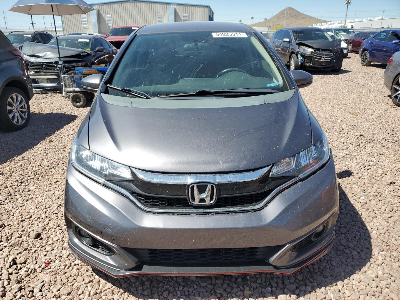 Photo 4 VIN: 3HGGK5G6XJM711012 - HONDA FIT 