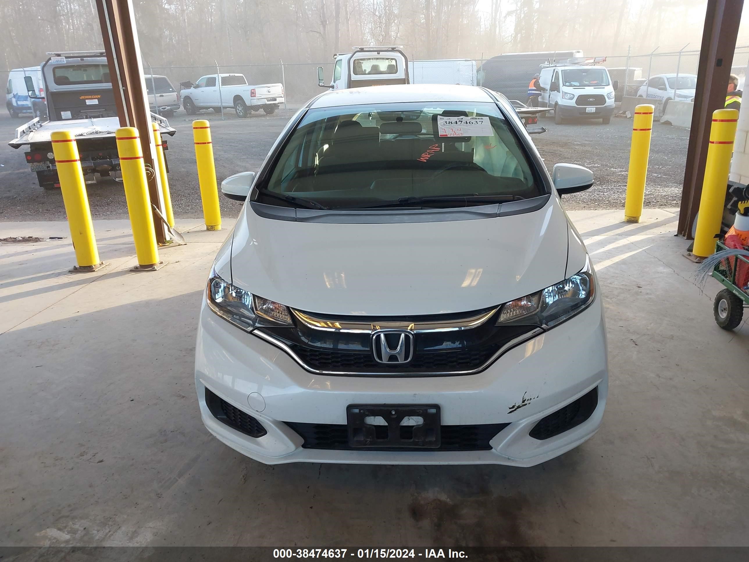 Photo 11 VIN: 3HGGK5H43JM734807 - HONDA FIT 