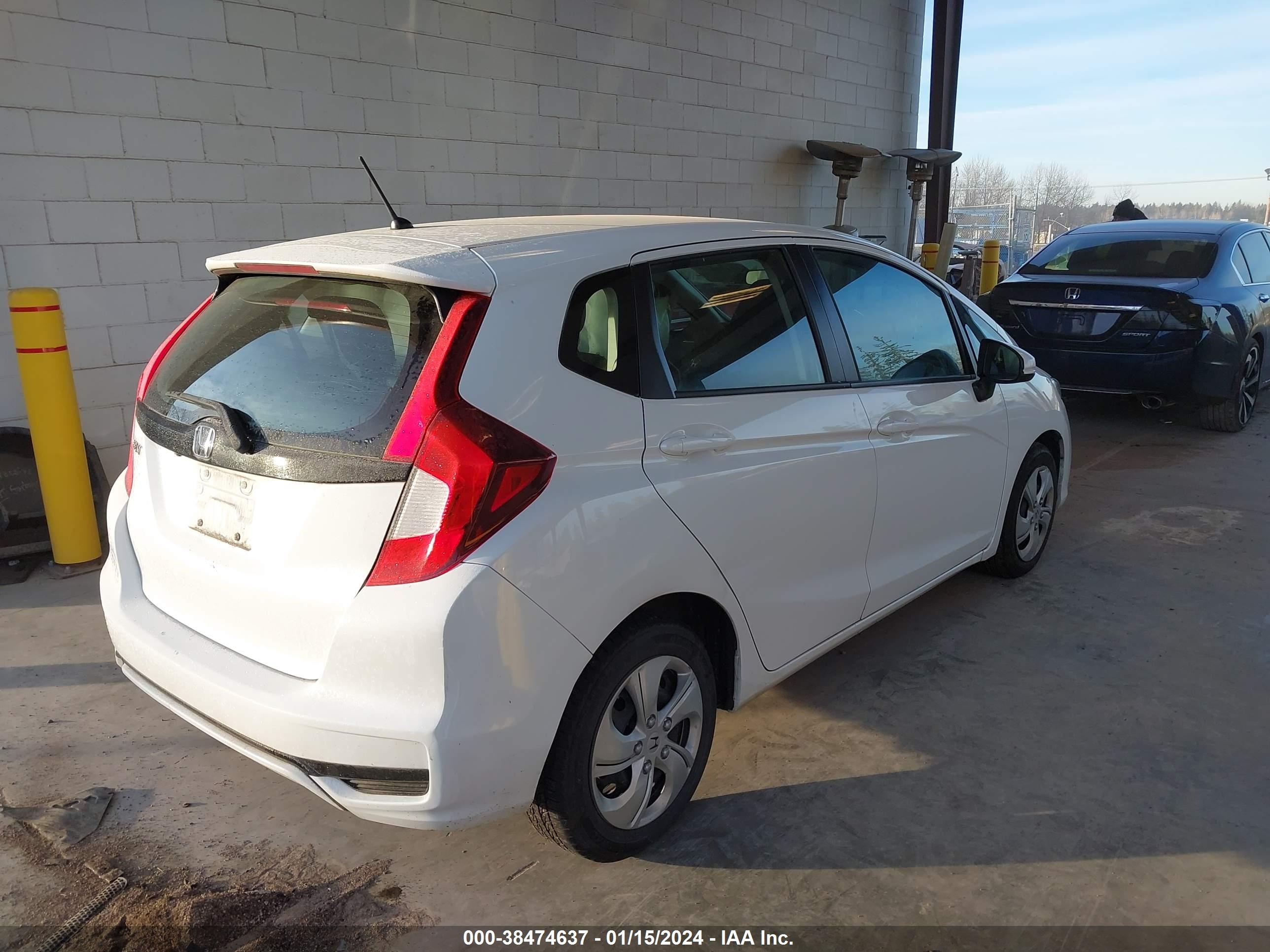 Photo 3 VIN: 3HGGK5H43JM734807 - HONDA FIT 