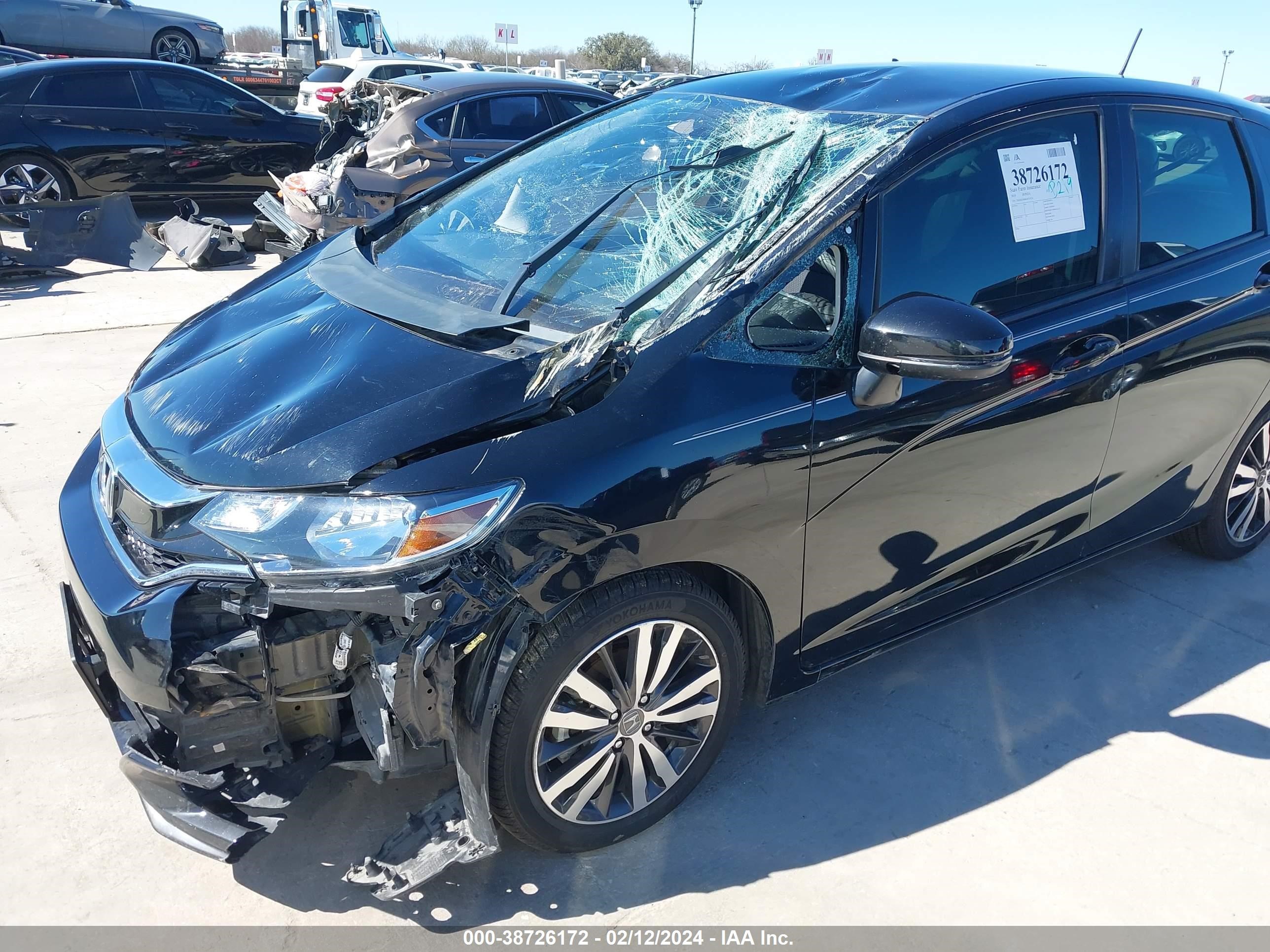 Photo 11 VIN: 3HGGK5H44KM714714 - HONDA FIT 