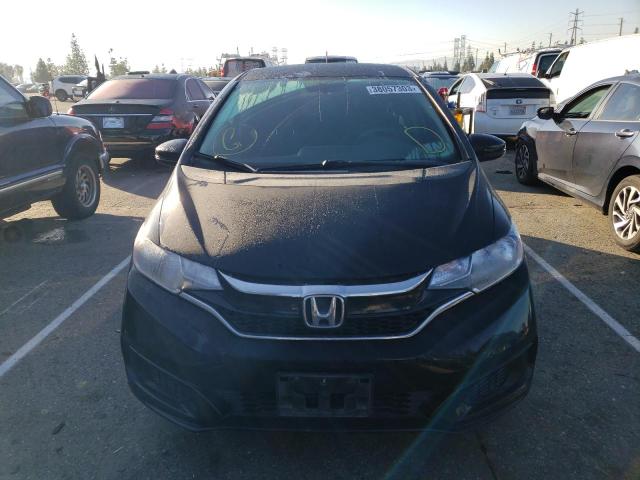 Photo 4 VIN: 3HGGK5H48JM728355 - HONDA FIT LX 