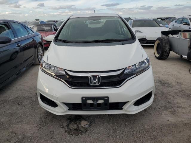 Photo 4 VIN: 3HGGK5H49JM718417 - HONDA FIT LX 