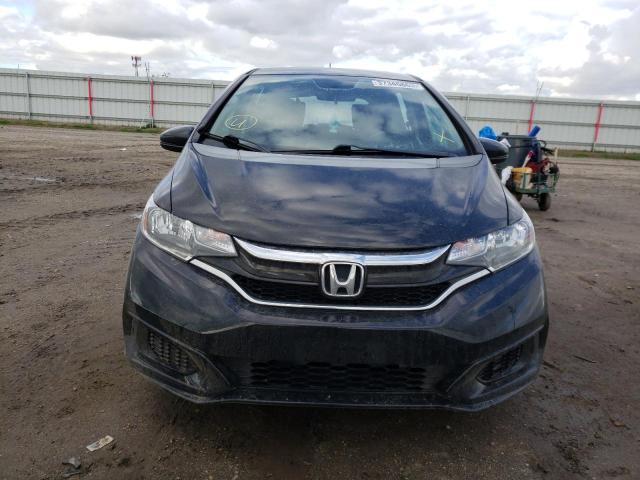 Photo 4 VIN: 3HGGK5H4XKM703488 - HONDA FIT LX 