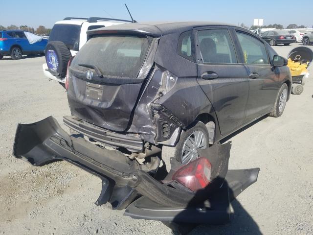 Photo 3 VIN: 3HGGK5H4XKM730349 - HONDA FIT LX 