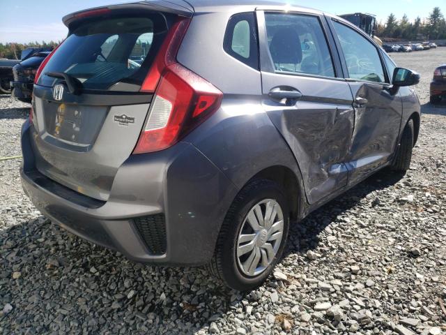 Photo 3 VIN: 3HGGK5H53GM104299 - HONDA FIT LX 