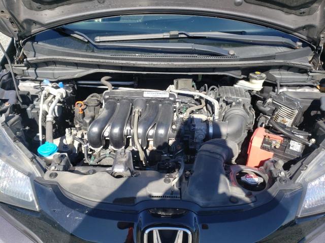 Photo 6 VIN: 3HGGK5H53GM104299 - HONDA FIT LX 