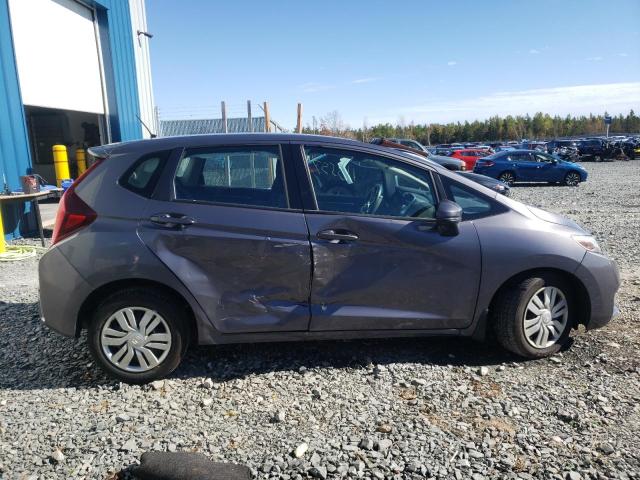 Photo 8 VIN: 3HGGK5H53GM104299 - HONDA FIT LX 