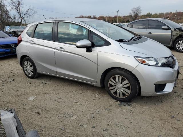 Photo 3 VIN: 3HGGK5H53GM702506 - HONDA FIT LX 