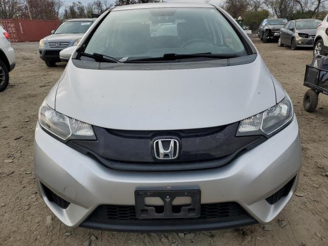 Photo 4 VIN: 3HGGK5H53GM702506 - HONDA FIT LX 