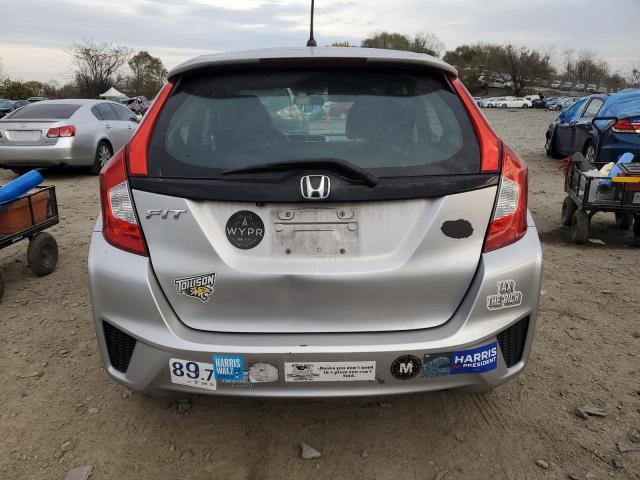 Photo 5 VIN: 3HGGK5H53GM702506 - HONDA FIT LX 