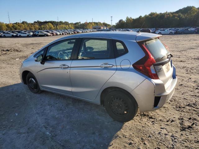 Photo 1 VIN: 3HGGK5H54GM700134 - HONDA FIT LX 