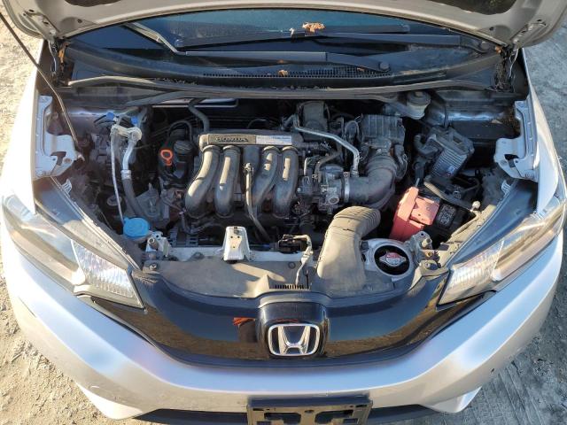 Photo 10 VIN: 3HGGK5H54GM700134 - HONDA FIT LX 