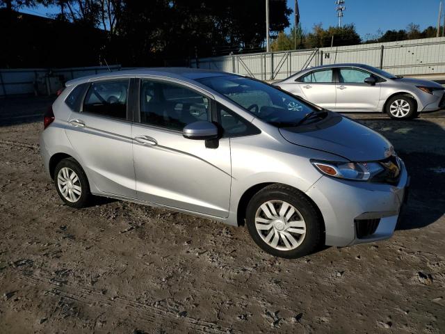 Photo 3 VIN: 3HGGK5H54GM700134 - HONDA FIT LX 