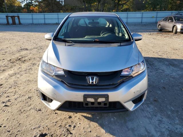 Photo 4 VIN: 3HGGK5H54GM700134 - HONDA FIT LX 