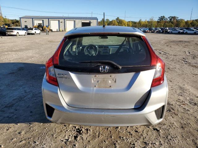 Photo 5 VIN: 3HGGK5H54GM700134 - HONDA FIT LX 