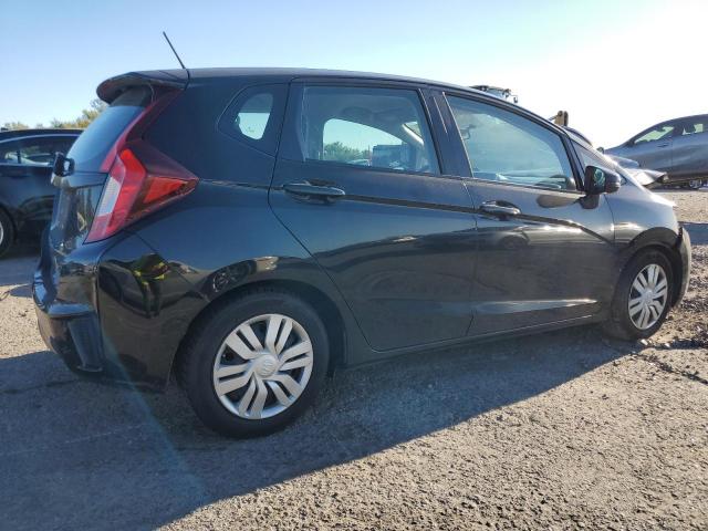 Photo 2 VIN: 3HGGK5H56GM704864 - HONDA FIT LX 