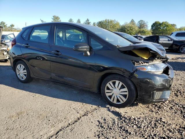 Photo 3 VIN: 3HGGK5H56GM704864 - HONDA FIT LX 