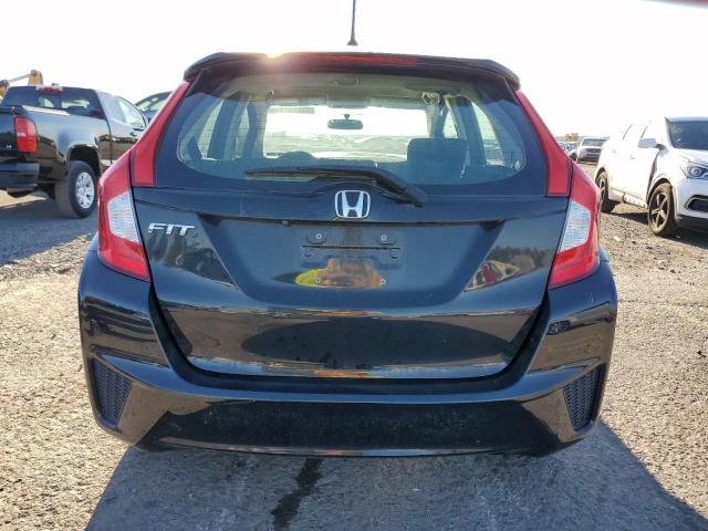 Photo 5 VIN: 3HGGK5H56GM704864 - HONDA FIT LX 