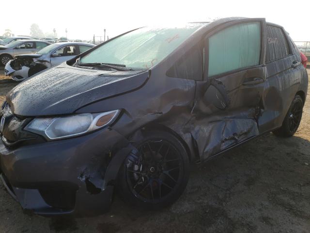 Photo 8 VIN: 3HGGK5H57FM710820 - HONDA FIT LX 