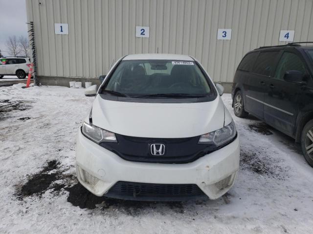 Photo 4 VIN: 3HGGK5H59FM107173 - HONDA FIT LX 